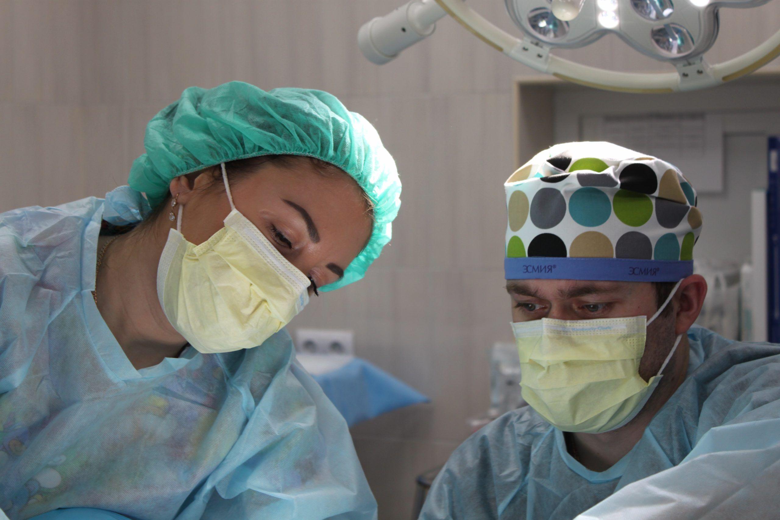 A picture of surgeons in an operating room.
