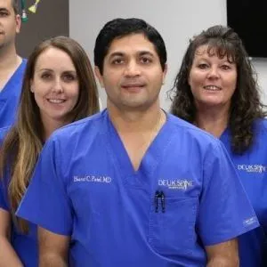 Picture of Dr. Bharath Patel with his team.
