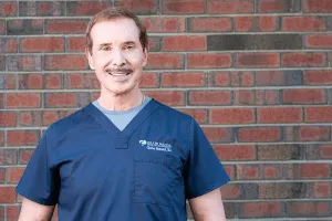 Dr. Charles Buzzanell.png