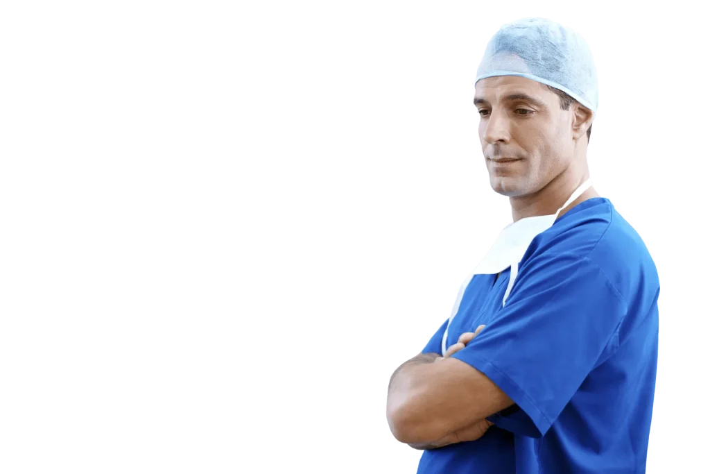 ale surgeon in blue scrubs and cap standing with arms crossed.