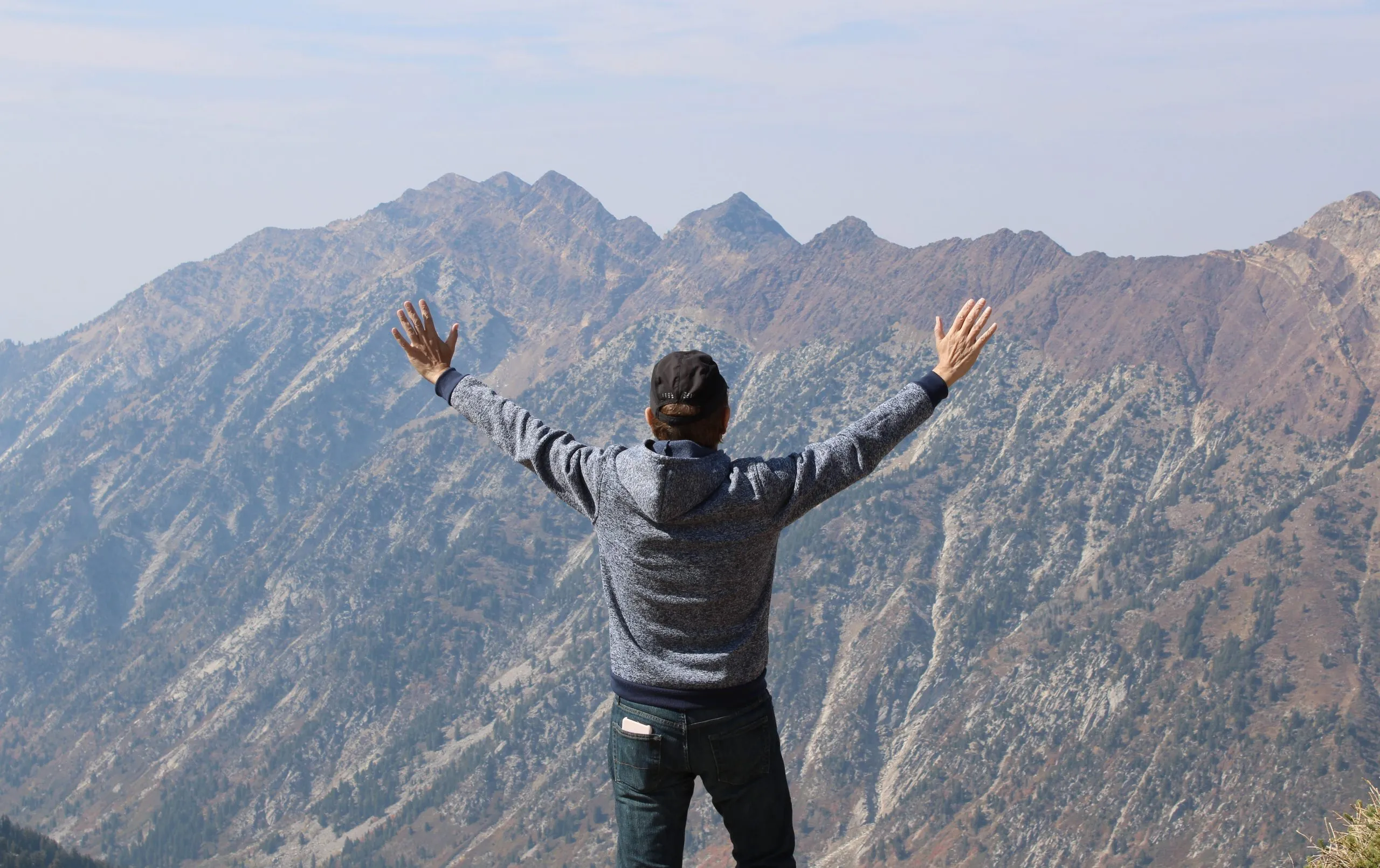 man-enjoying-the-mountain-view-2024-12-02-18-51-55-utc.jpg