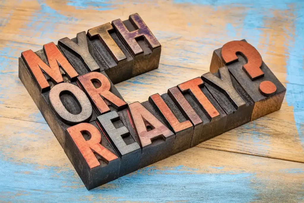 MYTH OR REALITY?" in vintage wood blocks highlights misconceptions about spinal surgery and treatment options.