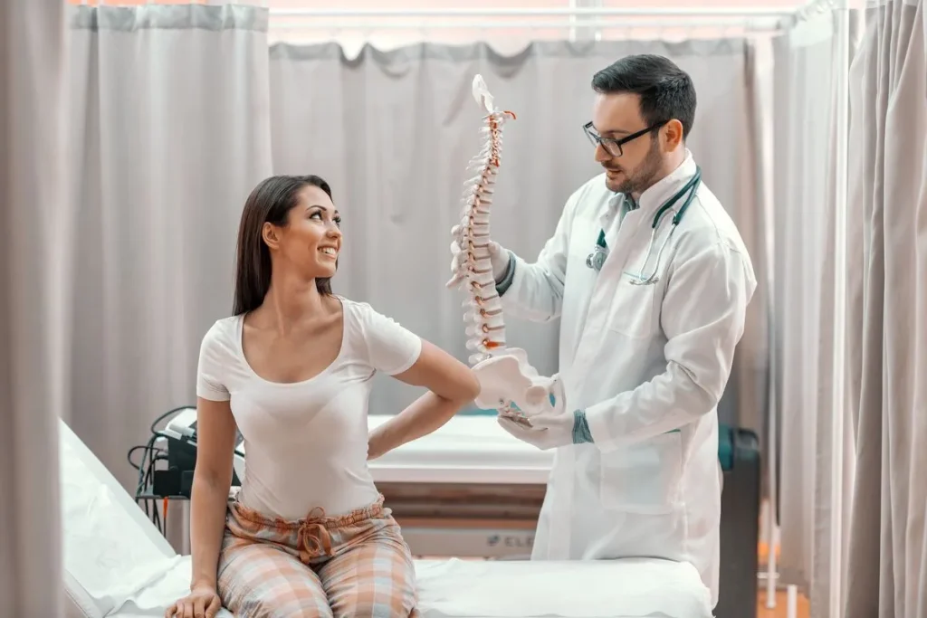 Patient and Surgeon explaining herniated disc