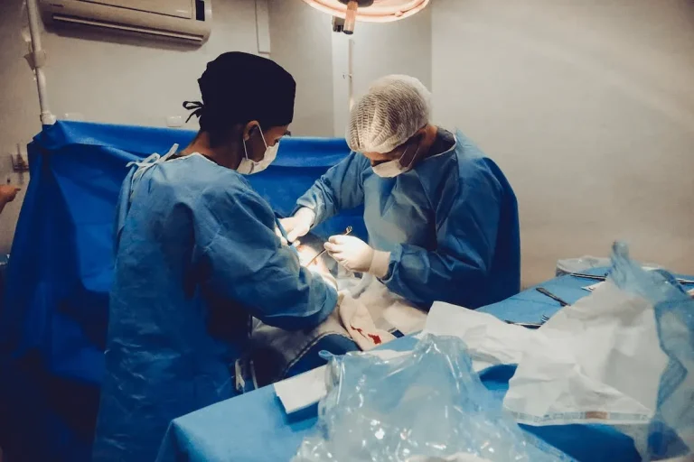Surgeons performing an operation in a sterile operating room.