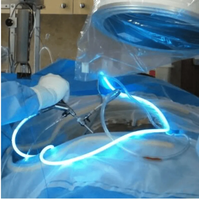 A surgeon performing Deuk Laser Disc Repair on a patient.