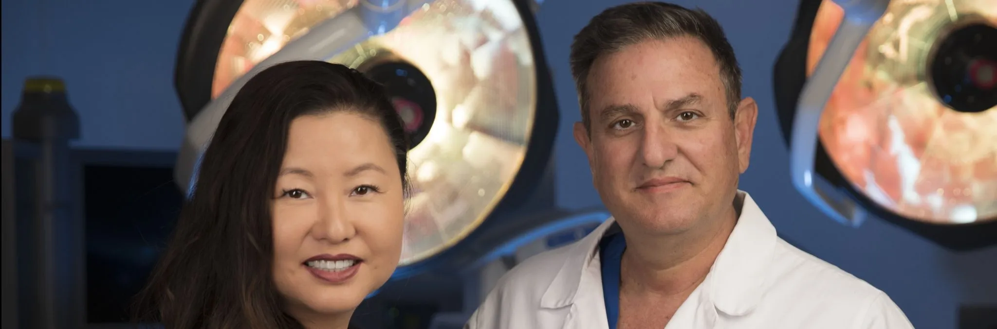 A single picture of deuk spine founders namely Dr. Ara Deukmedjian and Sun Deukmedjian. 