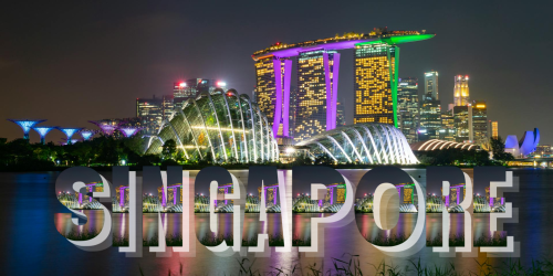 Night view of Singapore's skyline with illuminated landmarks and "Singapore" text overlay.