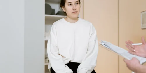 A scheduler explaining the terms of Deuk Spine Surgical Guarantee that would not be covered.