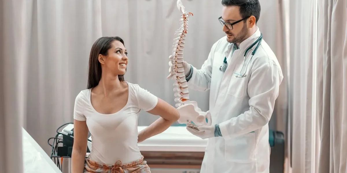 Patient and Surgeon explaining herniated disc