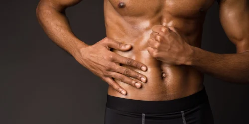 part-of-afro-mans-body-on-dark-gray-background-2025-03-18-18-39-28-utc