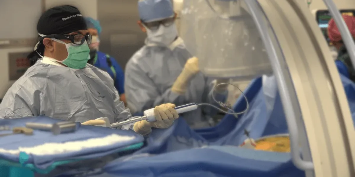 Medical team engaged in a surgical operation in a hospital setting.